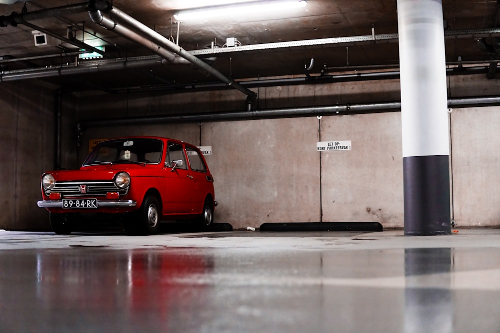 parked red 5-door hatchback