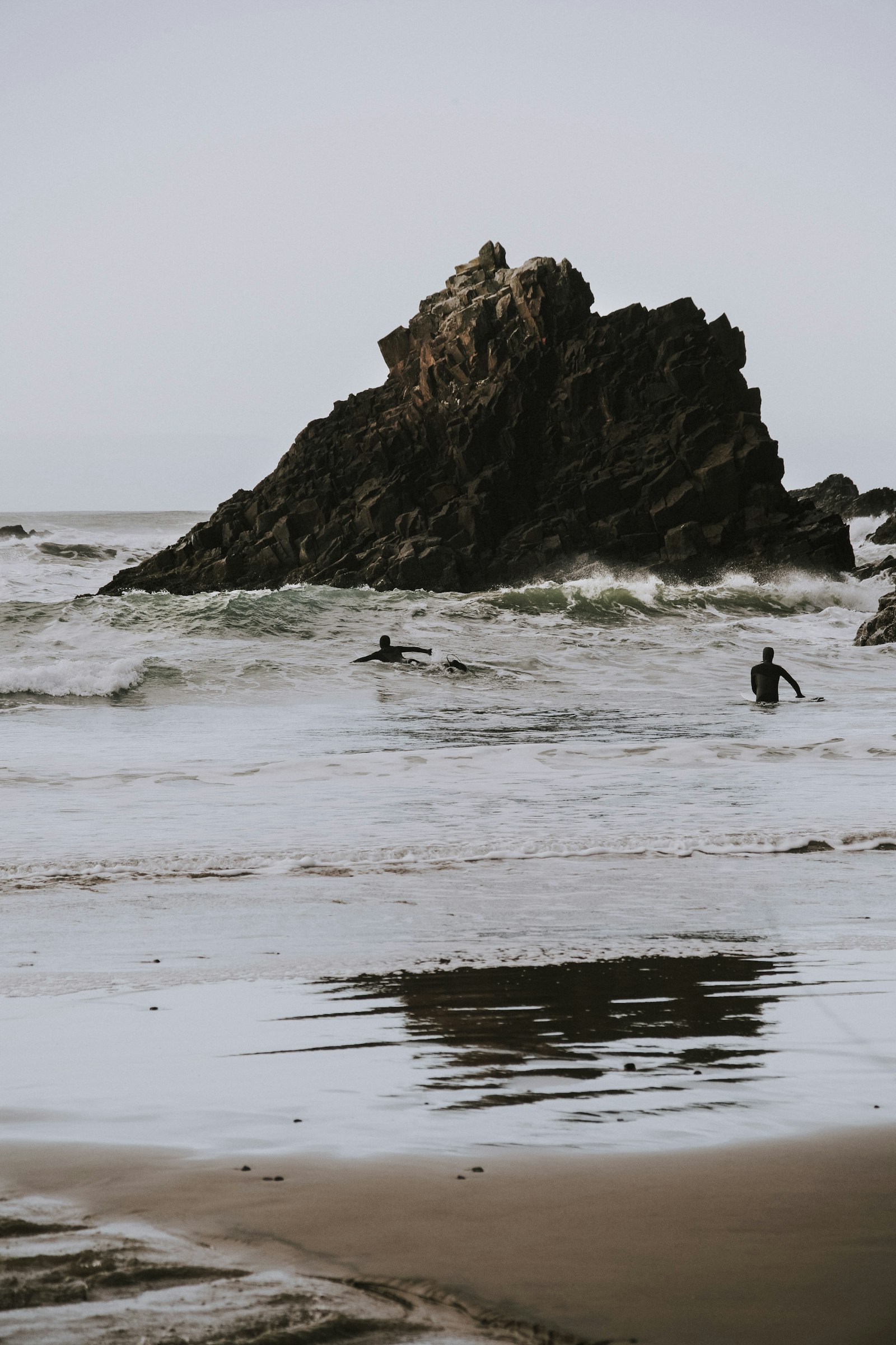 Canon EF 35-135mm f/4-5.6 USM sample photo. Surfers on water near photography