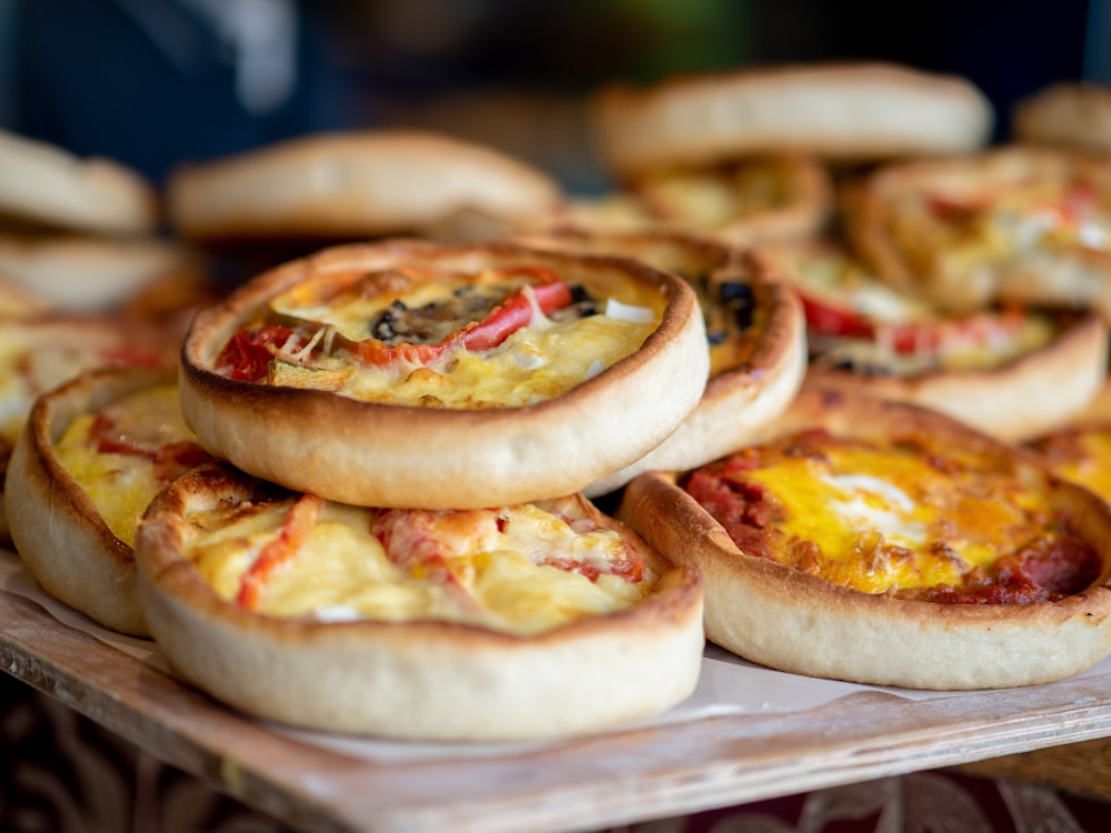 baked pizza on brown wooden table