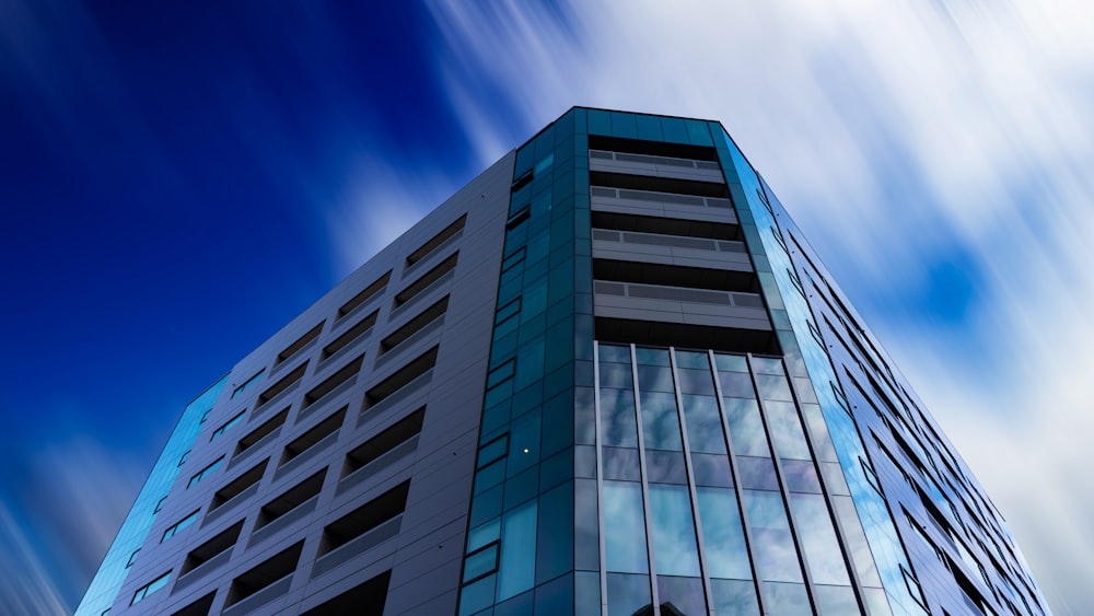 low angle view gray building in timelapse photography