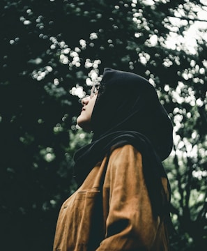 woman in black hijab headdress during daytime