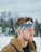 man with blue and white headband