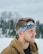 man with blue and white headband