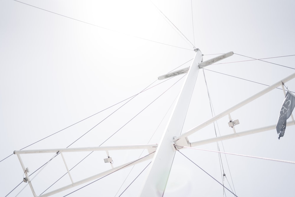 low-angle photography of white metal tower