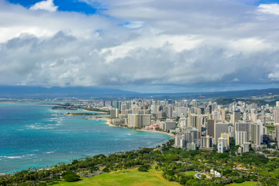 Waikiki and the Honolulu skyline along the shore, seen from Diamond Head on Oahu