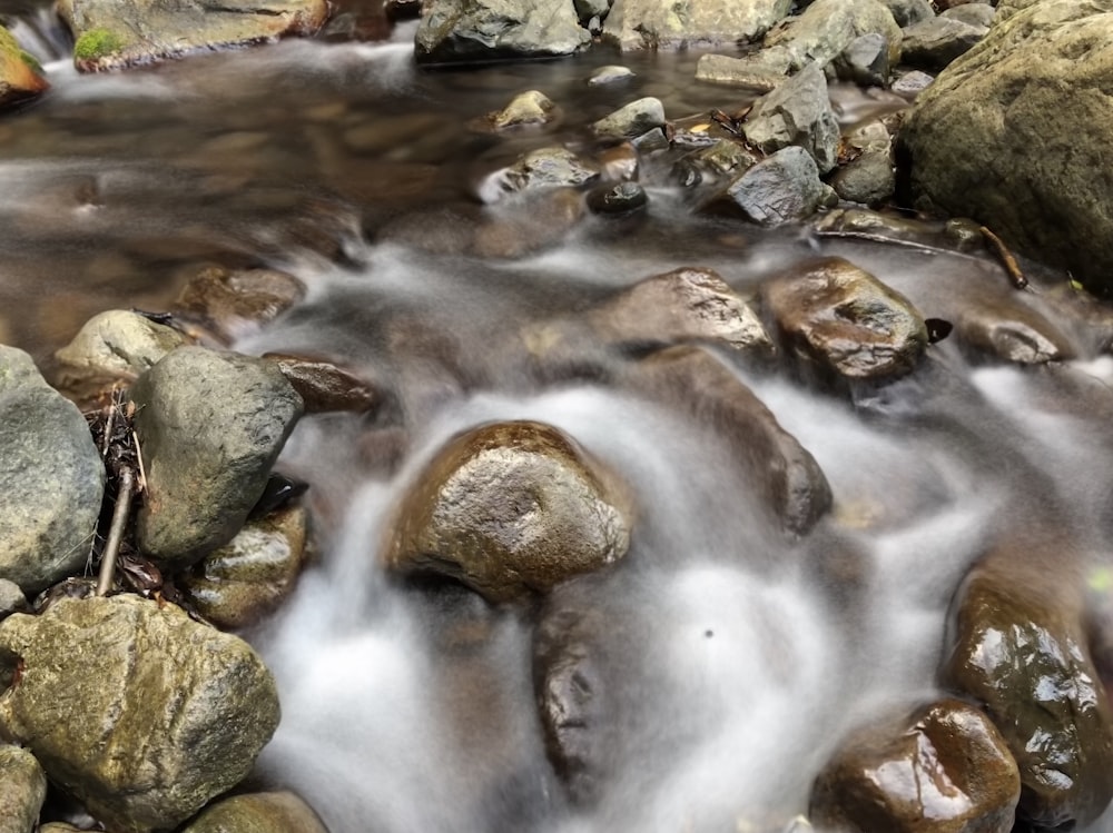 time-lapse photography of stream during daytime