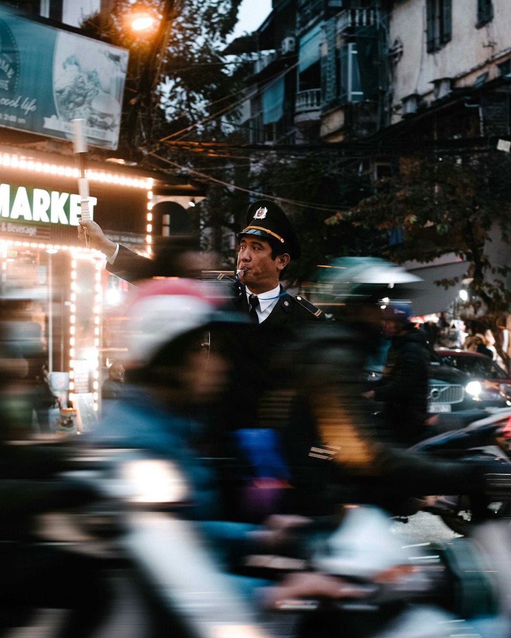 time lapse photography of riders and security