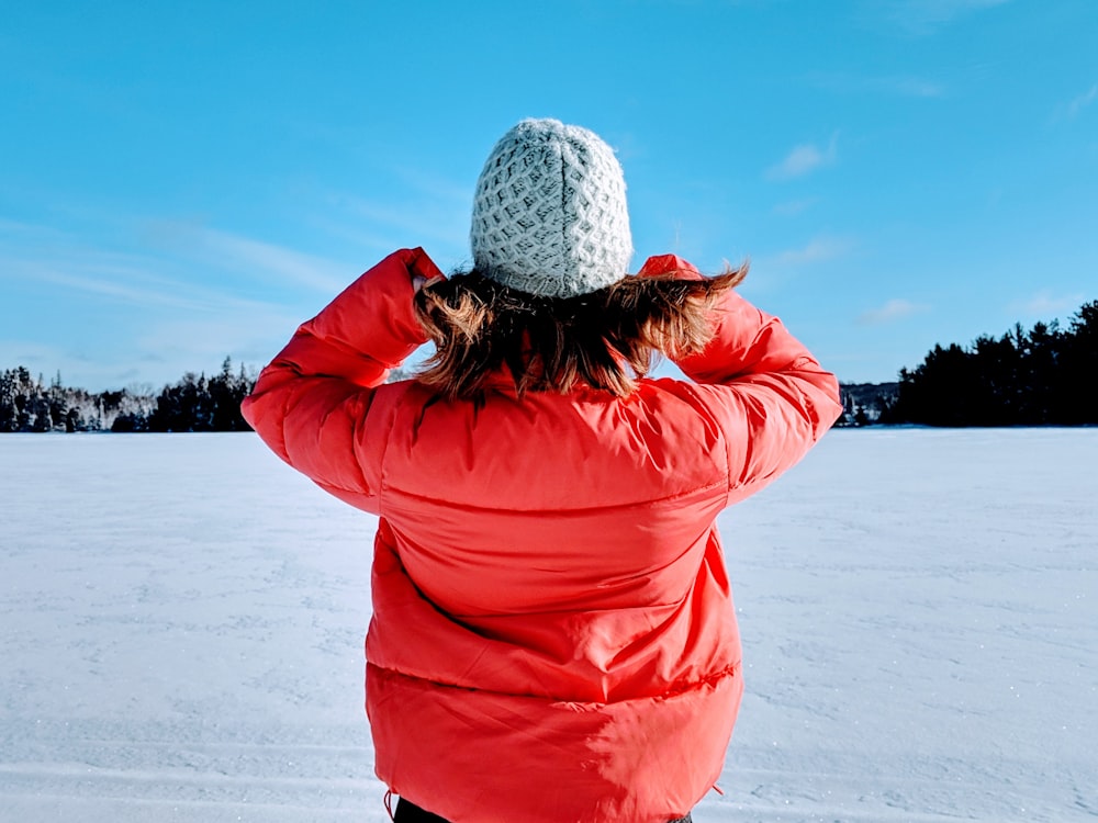 woman wearing red jacket