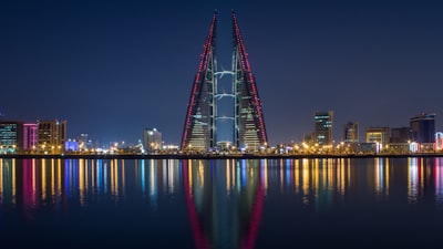 buildings at night bahrain zoom background