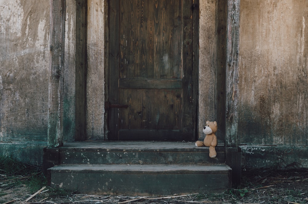 brown bear in the side of door