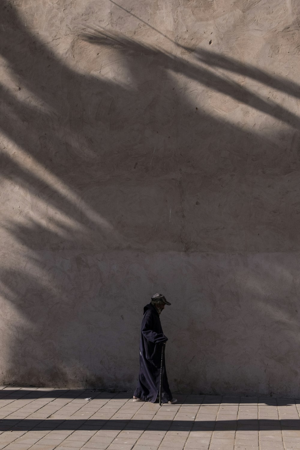 person walking on street during day time