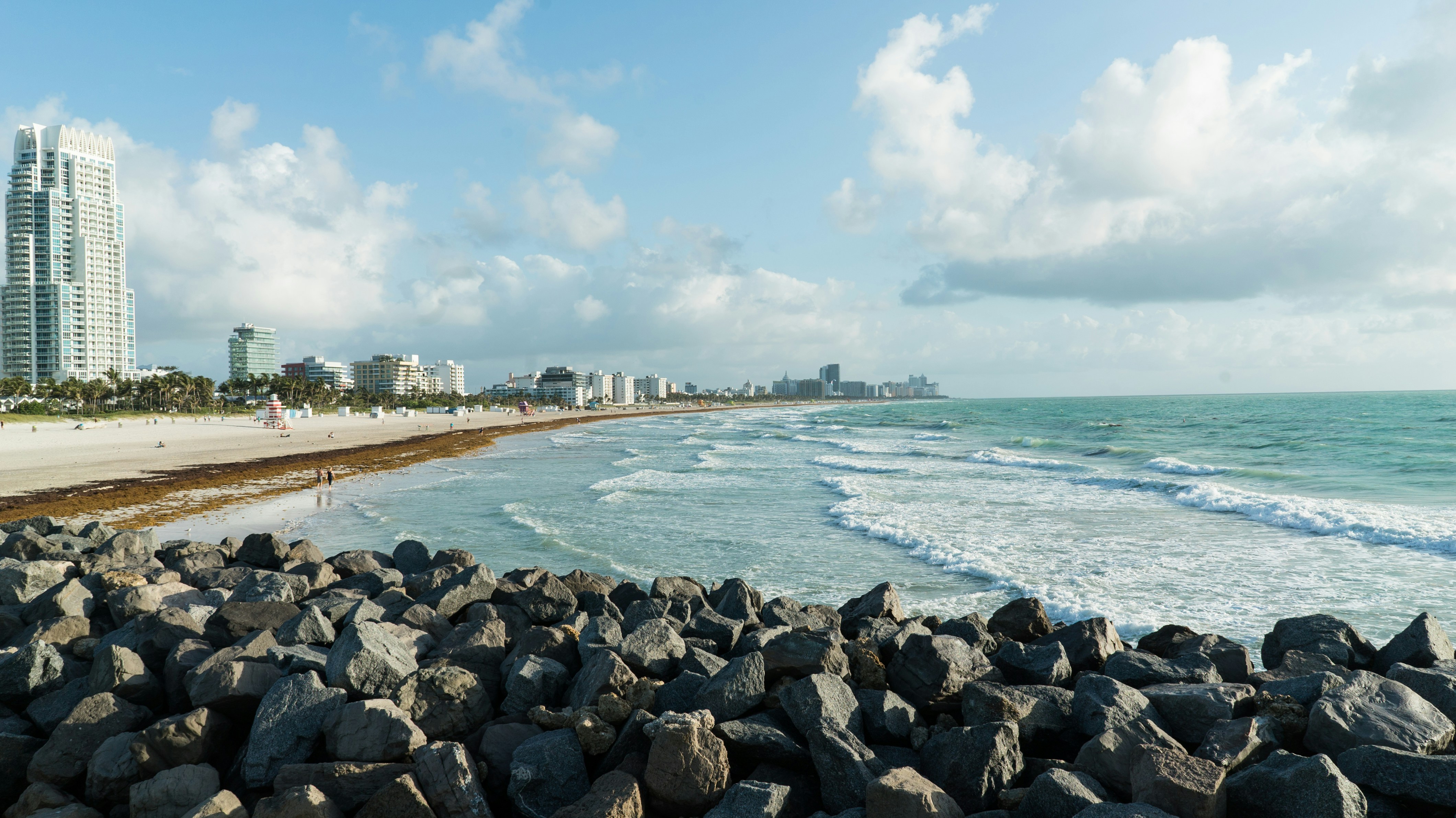 stones on shore during daytime, 