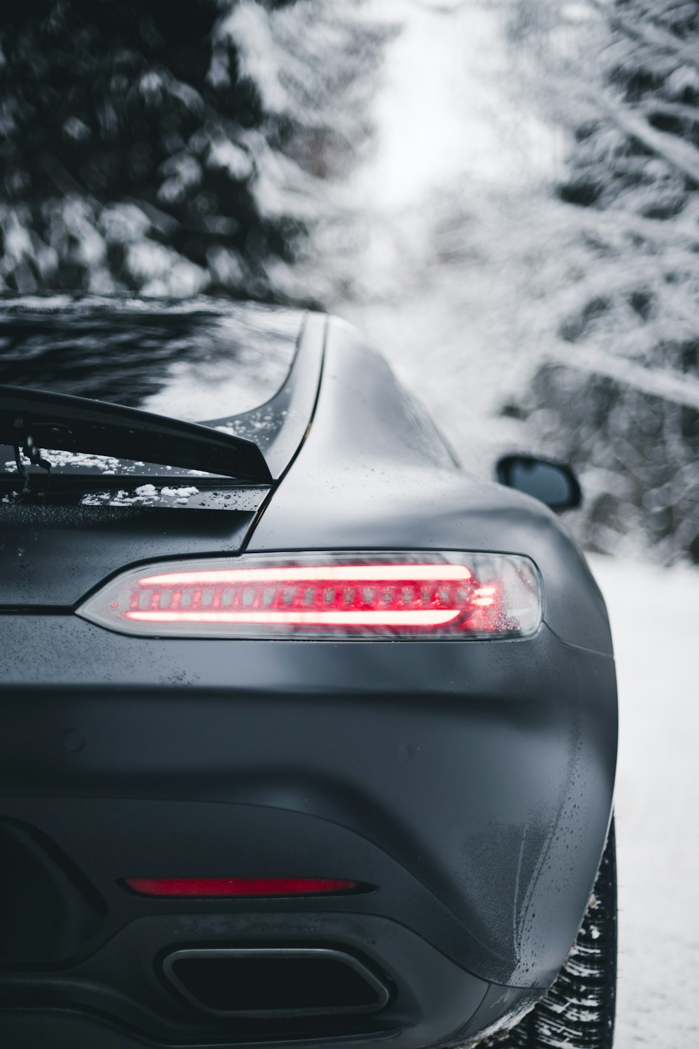 close-up photography of matte black sports car