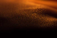 An artistic close-up image capturing vibrant colors and fine details of a handcrafted object.
