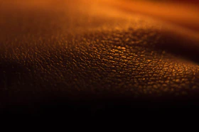 An artistic close-up image capturing vibrant colors and fine details of a handcrafted object.