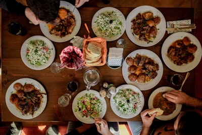 white plates with assorted foods lunch google meet background