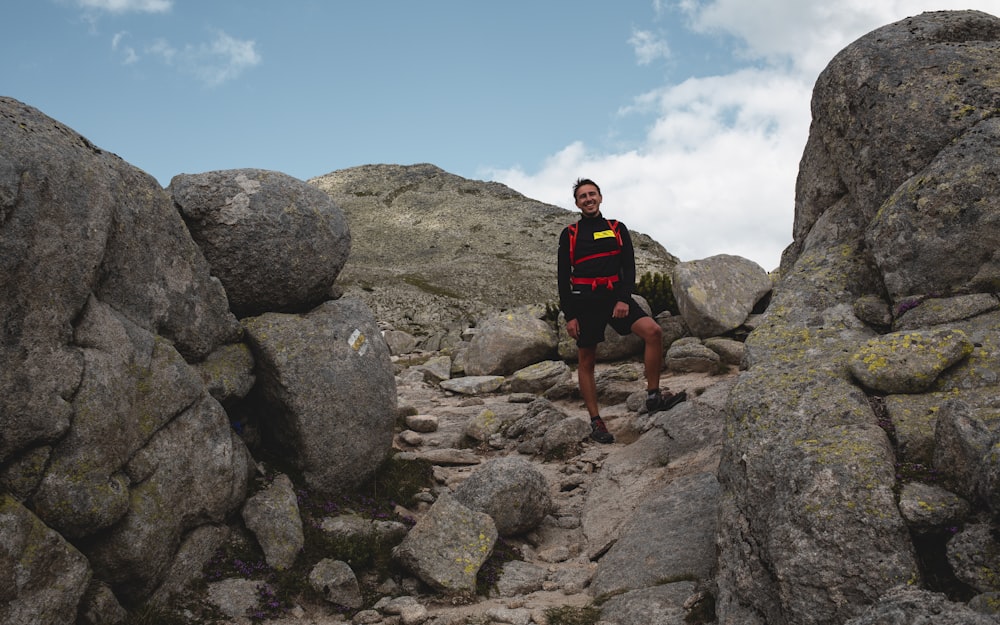 man standing on stone