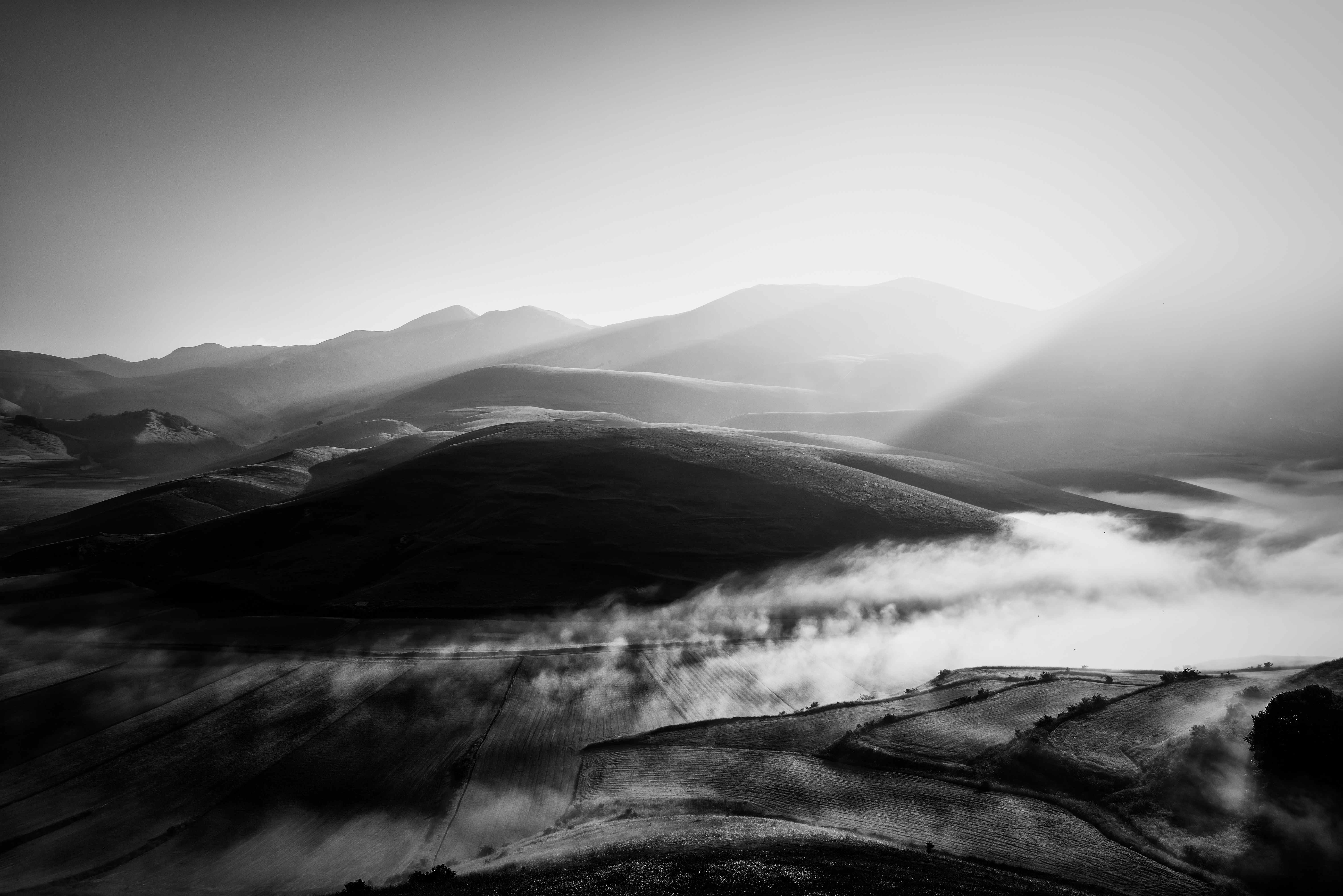 grayscale photo of mountains