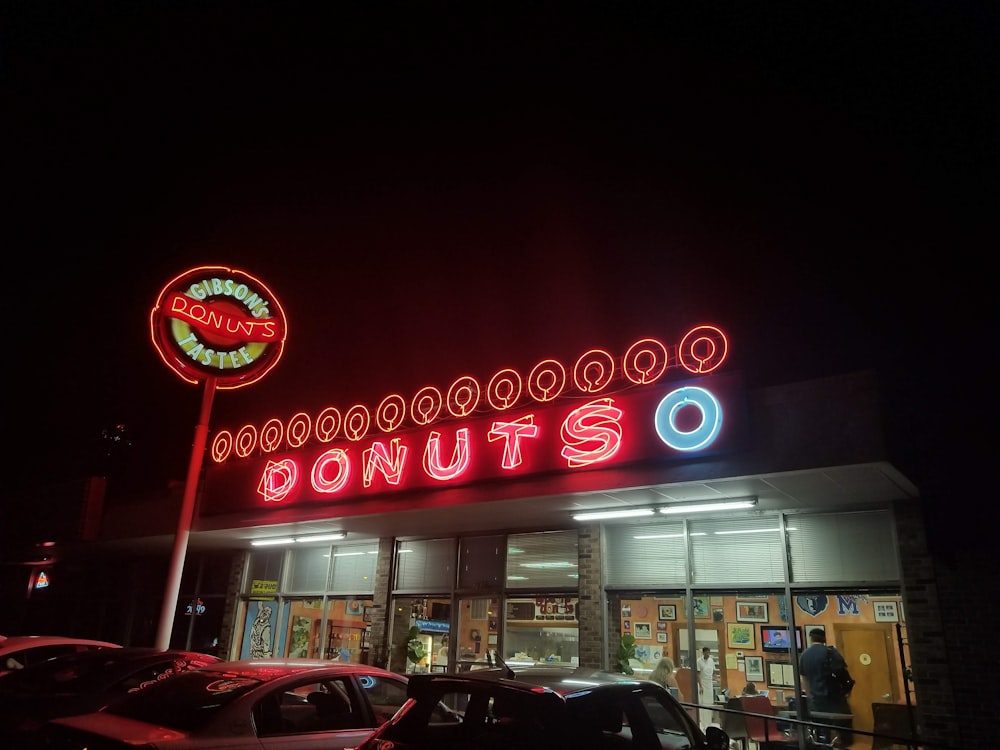 Donuts O store front during nighttime