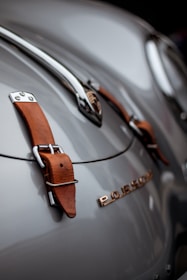 gray and brown leather belt