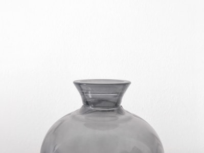 A sleek, minimalist modern vase with clean lines and a matte finish.