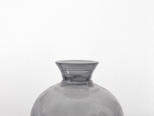 An elegant ceramic vase with a minimalist aesthetic.