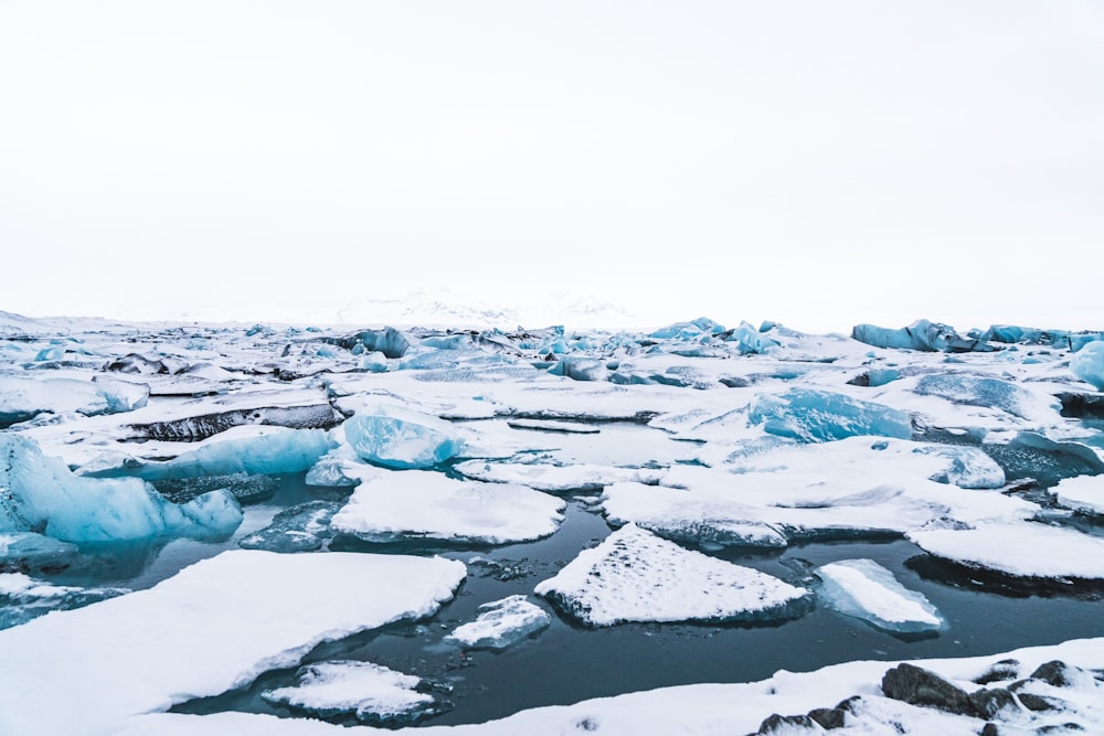 ice berg under white sky