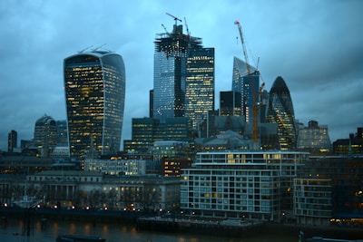 A modern Riyadh skyline at sunset highlighting new real estate developments.