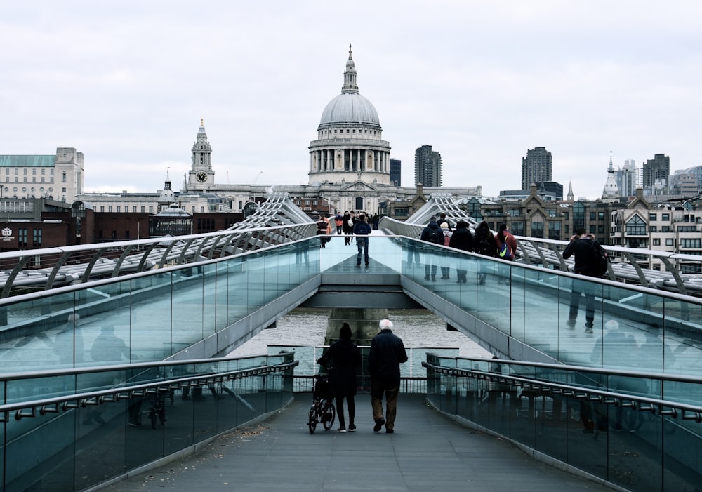 two people walking down the aisle overlooking building