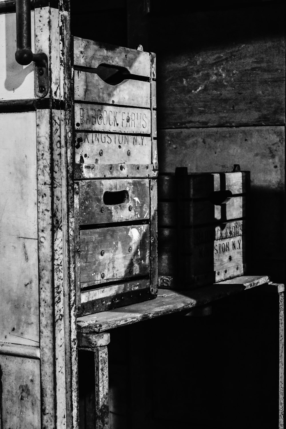 gray scale of wooden crate