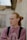 selective focus photography of man wearing pink crew-neck long-sleeved shirt