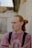 selective focus photography of man wearing pink crew-neck long-sleeved shirt