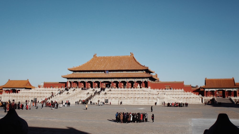 crowd of people at the temple during daytime