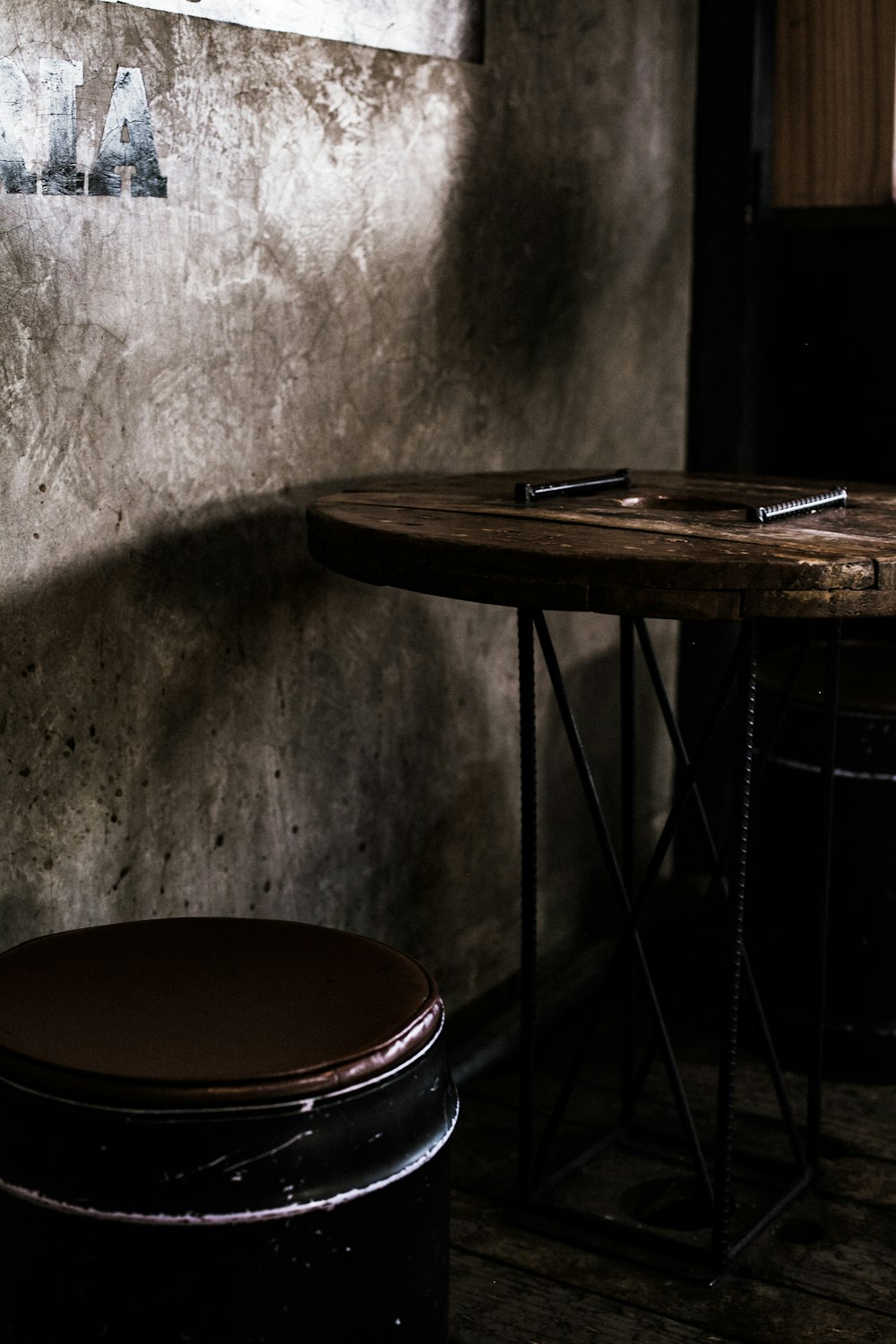 brown table beside wall