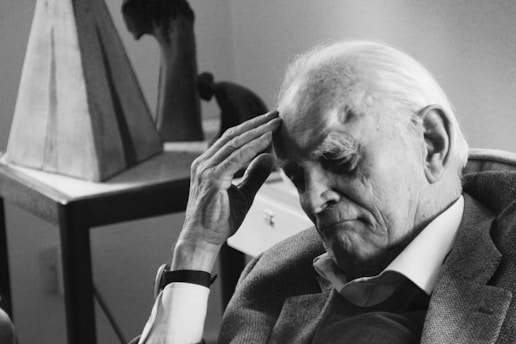 A thoughtful philosopher contemplating life.