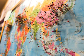 A vibrant world map highlighting Globalynk's key representative locations with glowing connection lines.