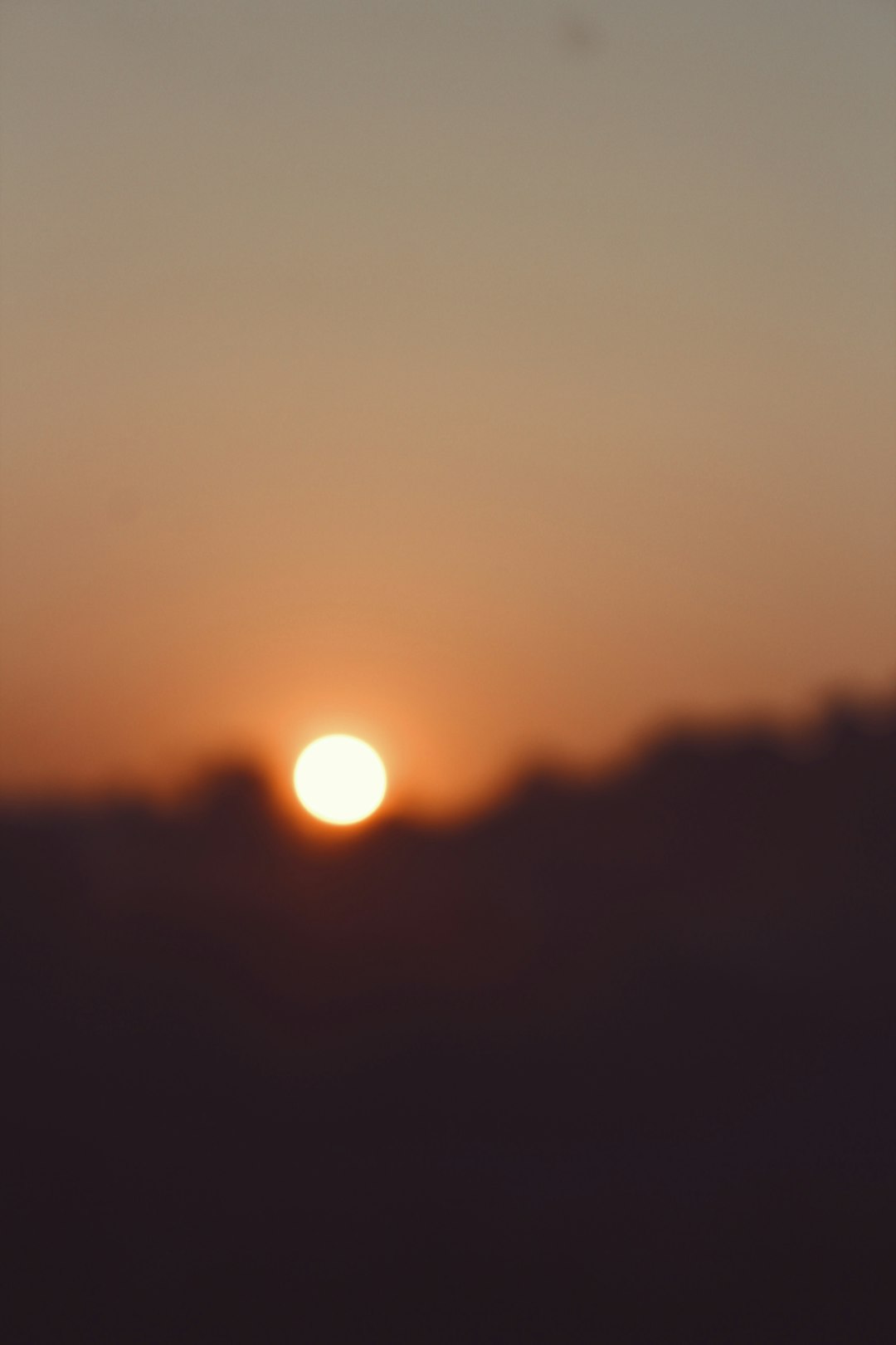 silhouette of mountain during sunset