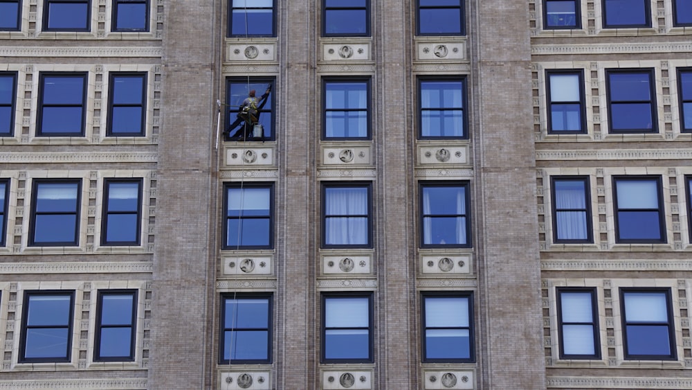 building with blue window curtains