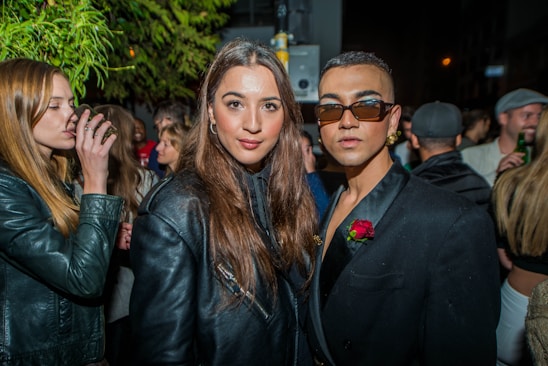 Diverse group of people showcasing stylish outfits outdoors