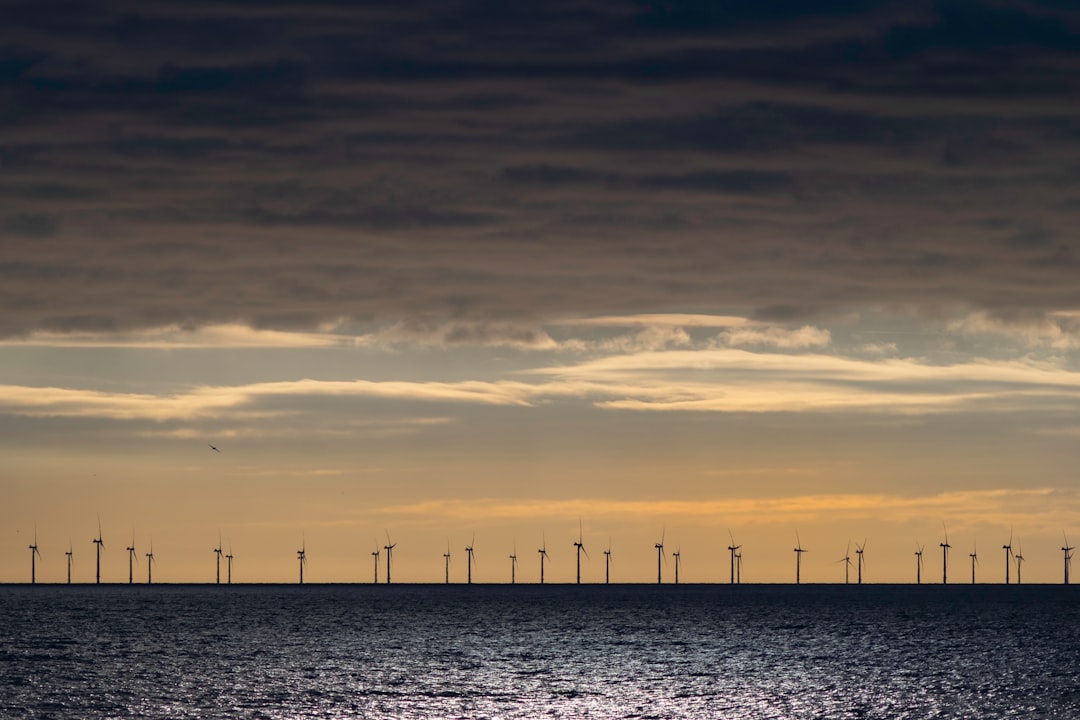 calm sea under grey clouds