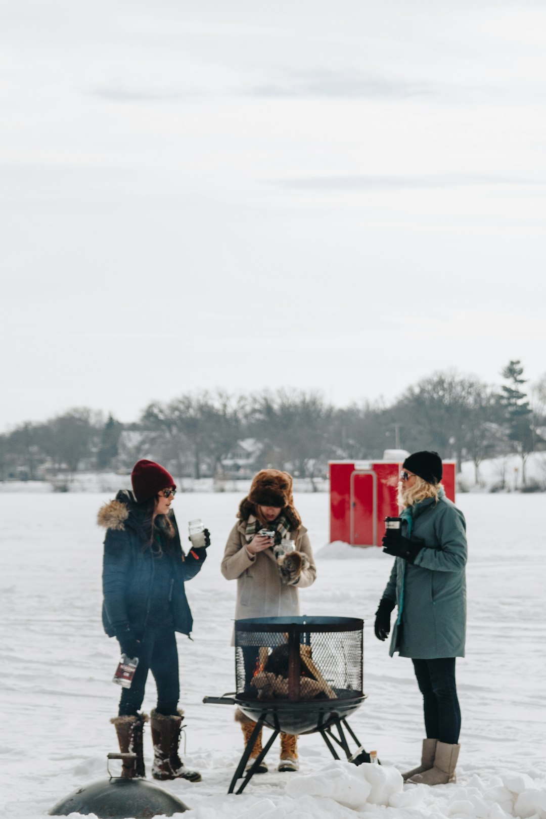 fire pit between three women