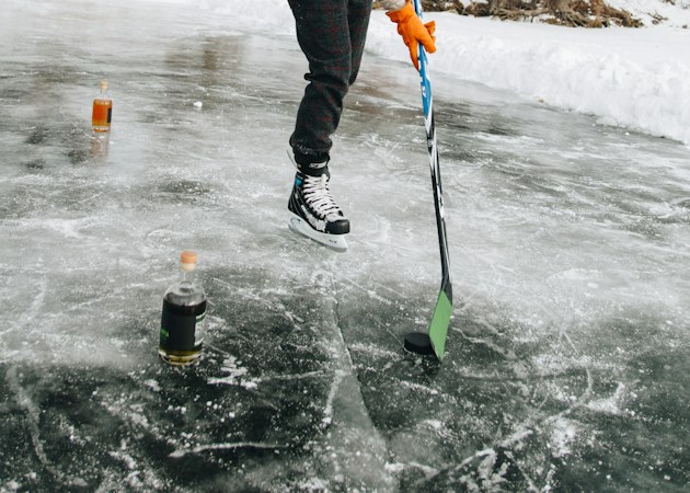 An ice hockey player skating with the puck, a reminder of the youth and adult hockey scene that has grown around the Vegas Golden Knights