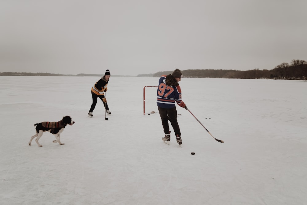 two men playing ice hockey game