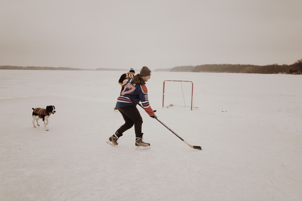 man playing ice hockey