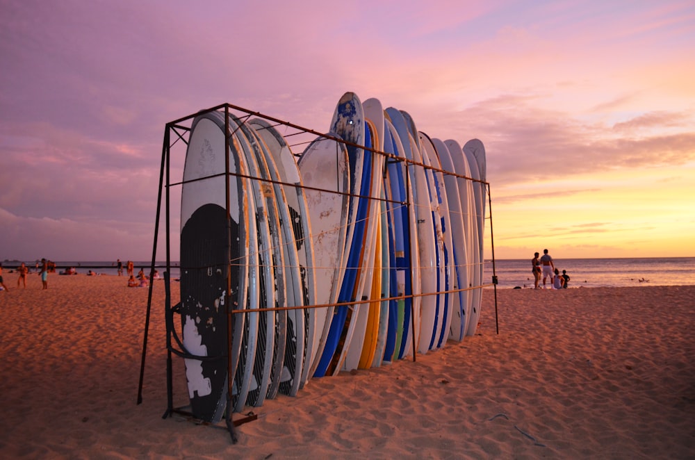 organize surfboard in rack at beach