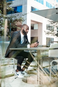 man looking at phone