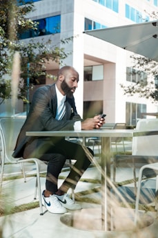man looking at phone