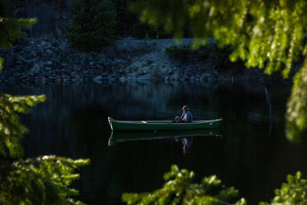 man riding boat