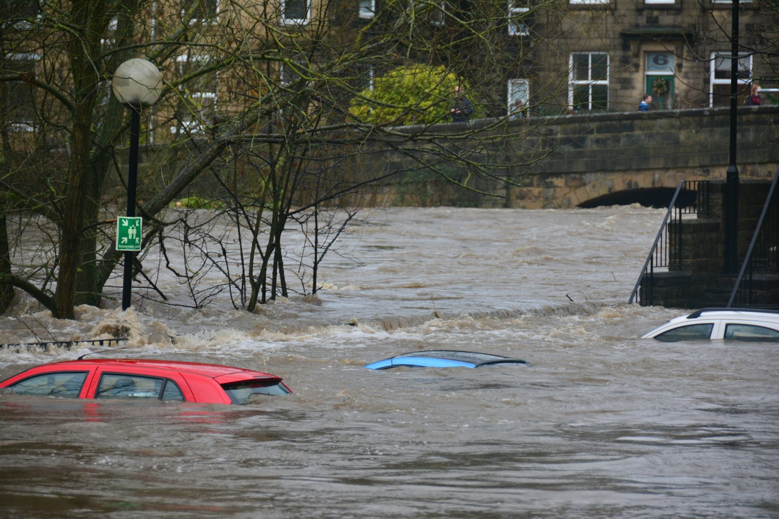 Flooded residential street in heavy rain