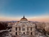 aerial photo of dome building under blue sky at daytime